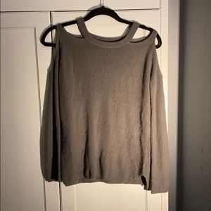 Gray cut shoulder sweater.